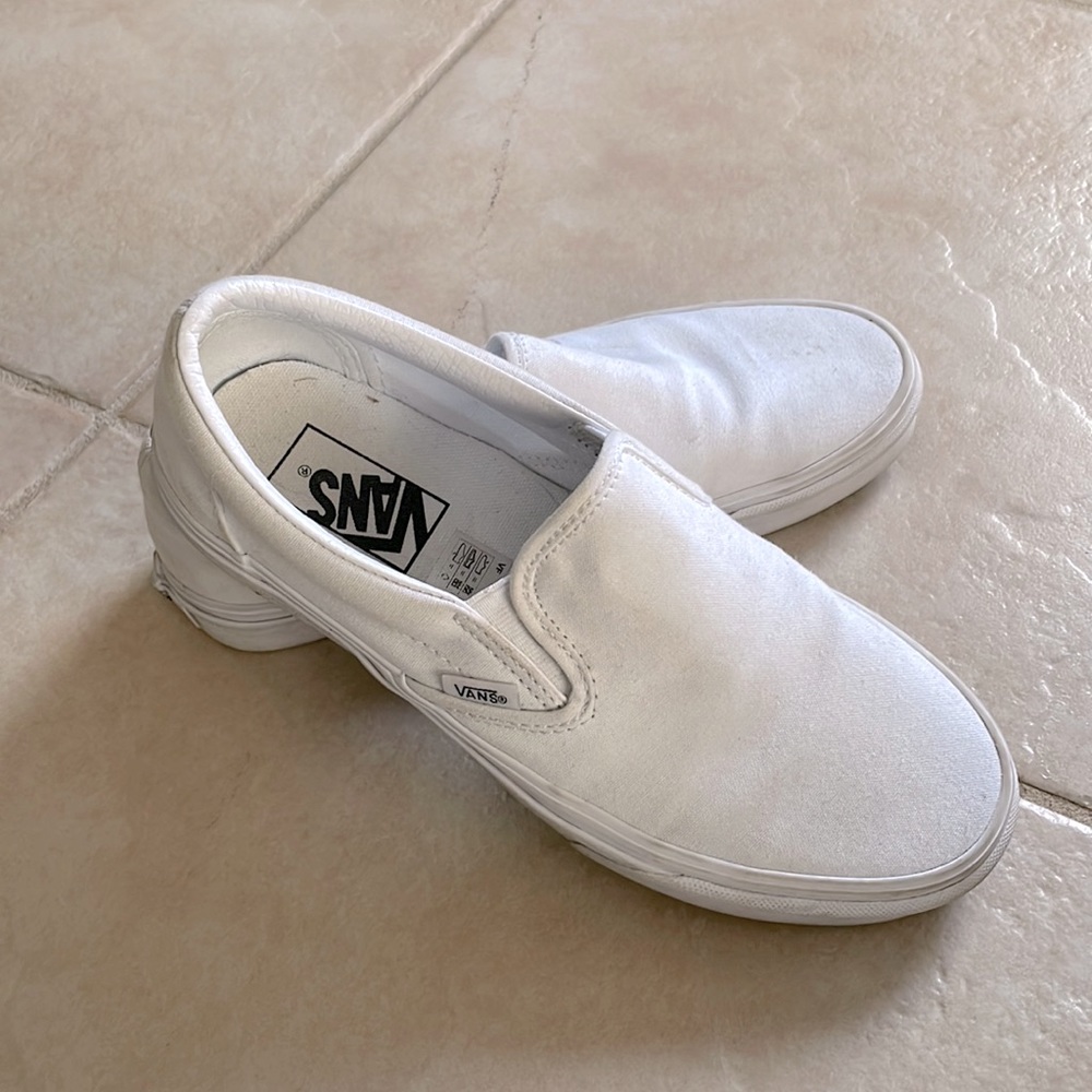 Vans solid white slip ons size Mens 7/ Womens 8.5